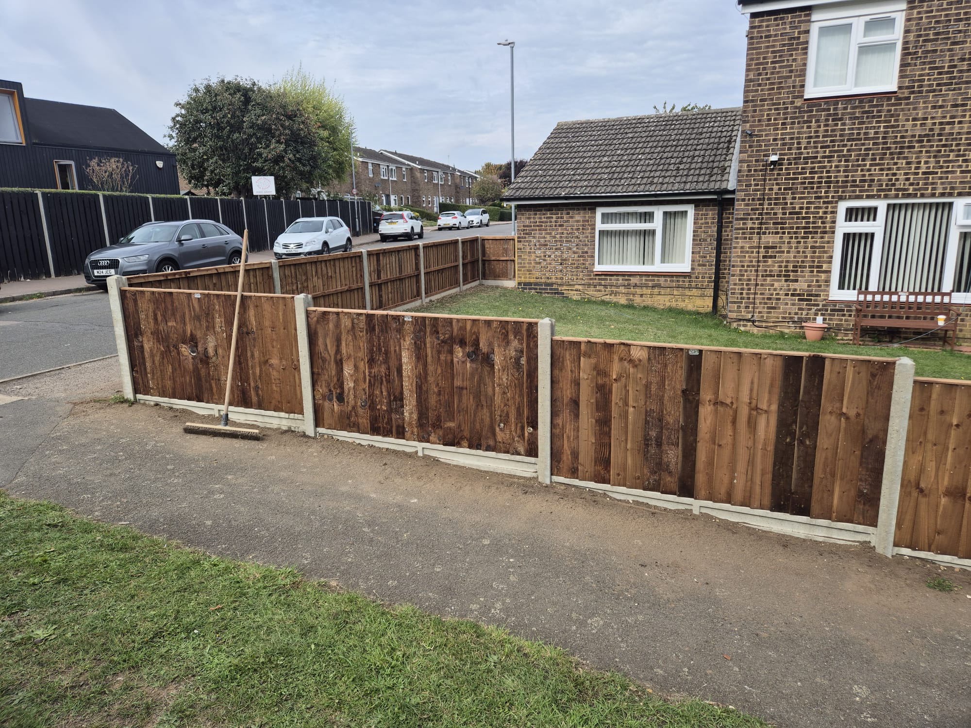 Slatted fence and decking installation by Boyde Landscapes.